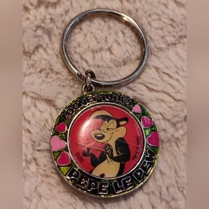 Warner Bros. Pepe Le Pew Keychain - Pink and Green